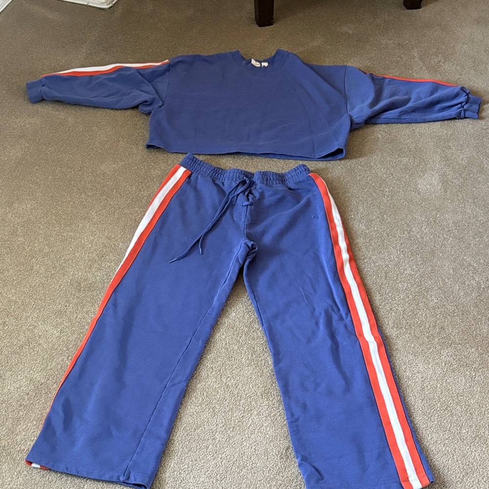 Roxy woman’s Blue Sweat-pant suit-with Orange & White Side Stripes